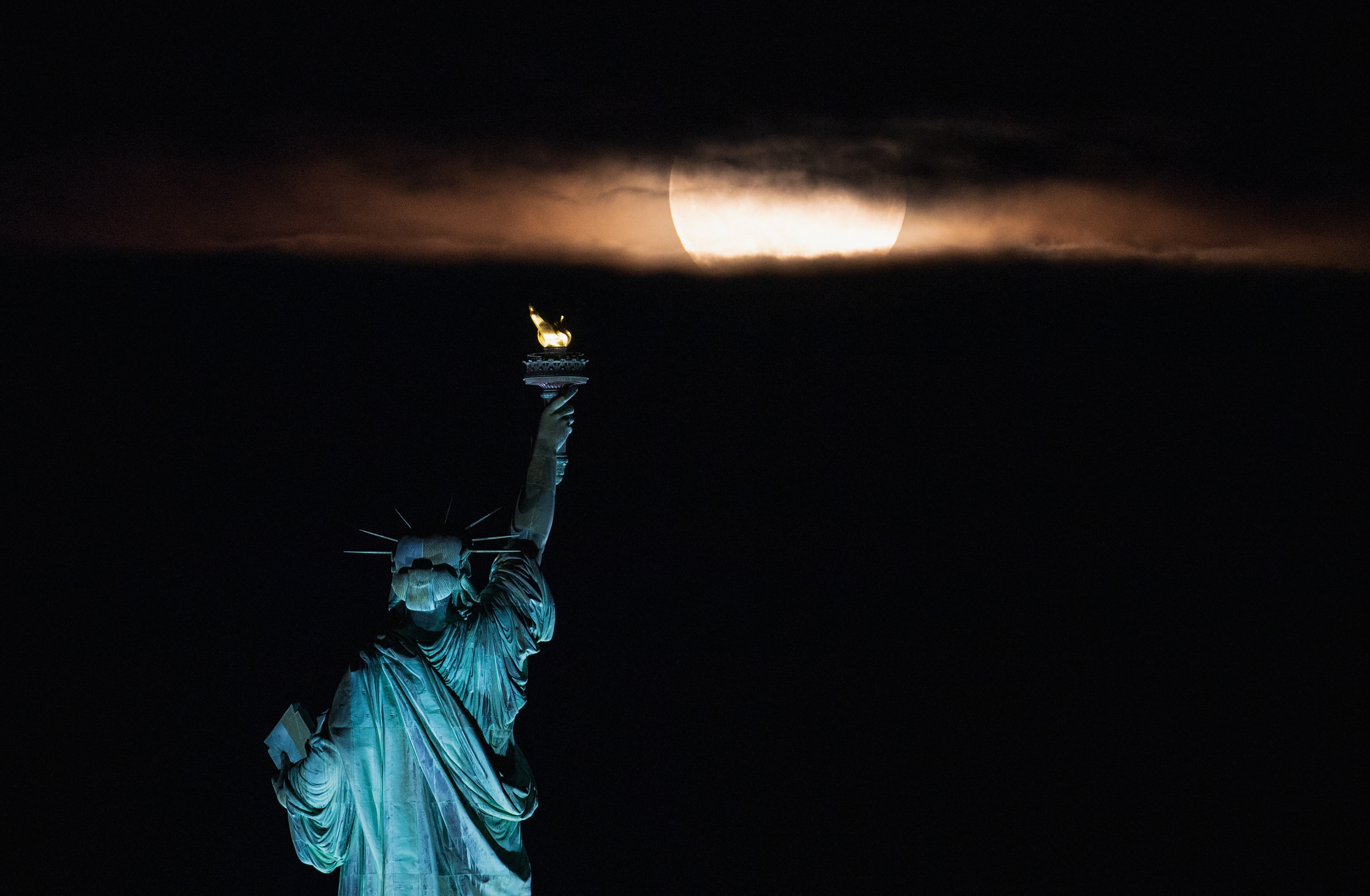 Photos: June 2021 Strawberry Moon brightens the night sky