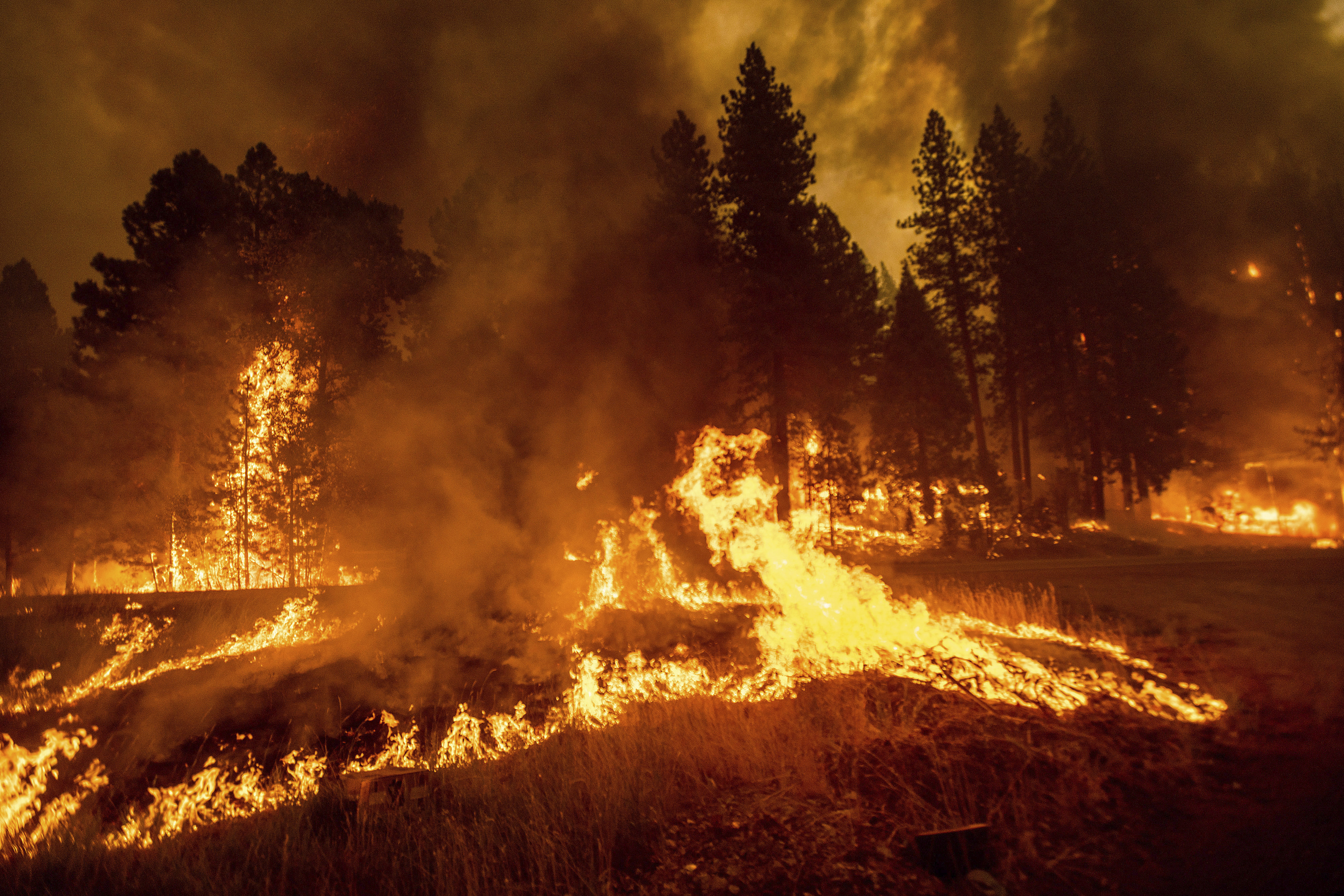Photos: California's Dixie Fire engulfs Greenville