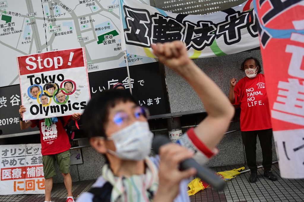 Photos: Nearly empty venues, protests in Tokyo ahead of Olympics opening ceremony