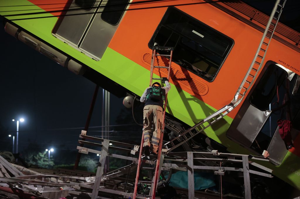 Mexico City metro overpass collapses onto road