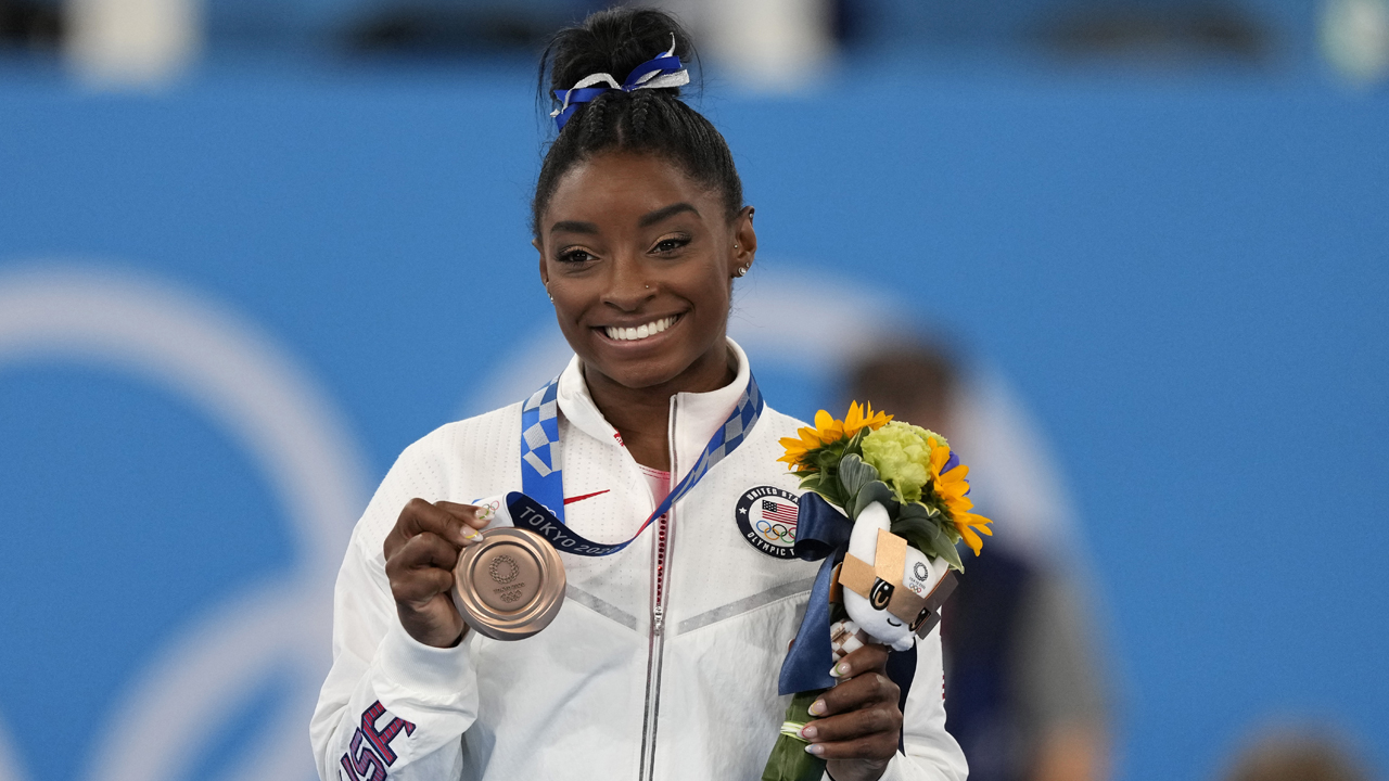 Photos: Simone Biles wins bronze in Olympic balance beam final