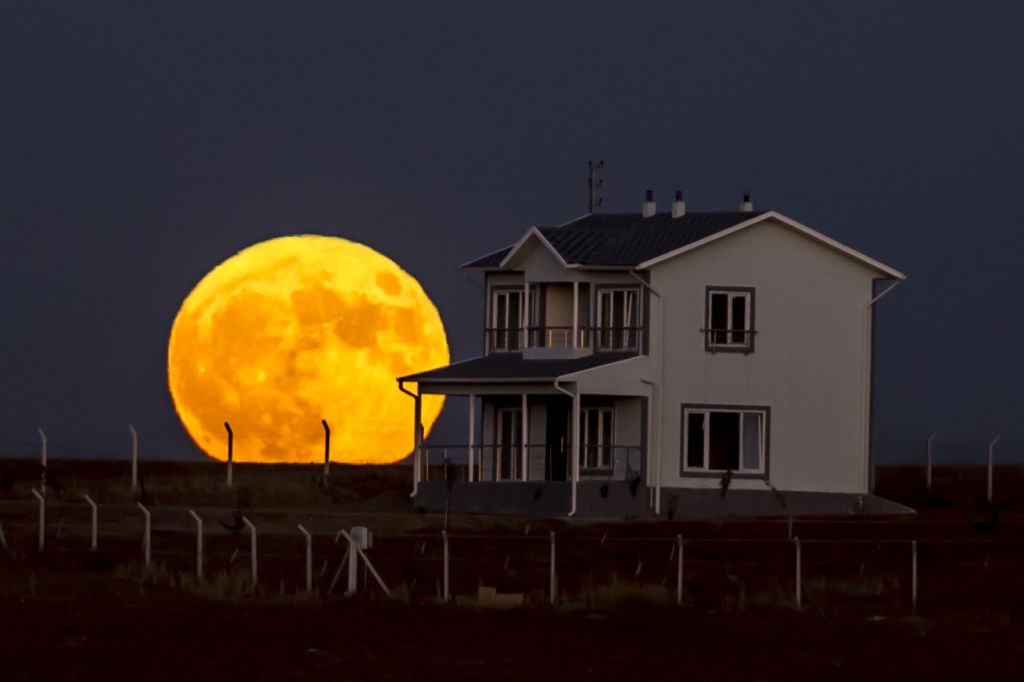 Photos: Halloween Blue Moon brightens the night sky