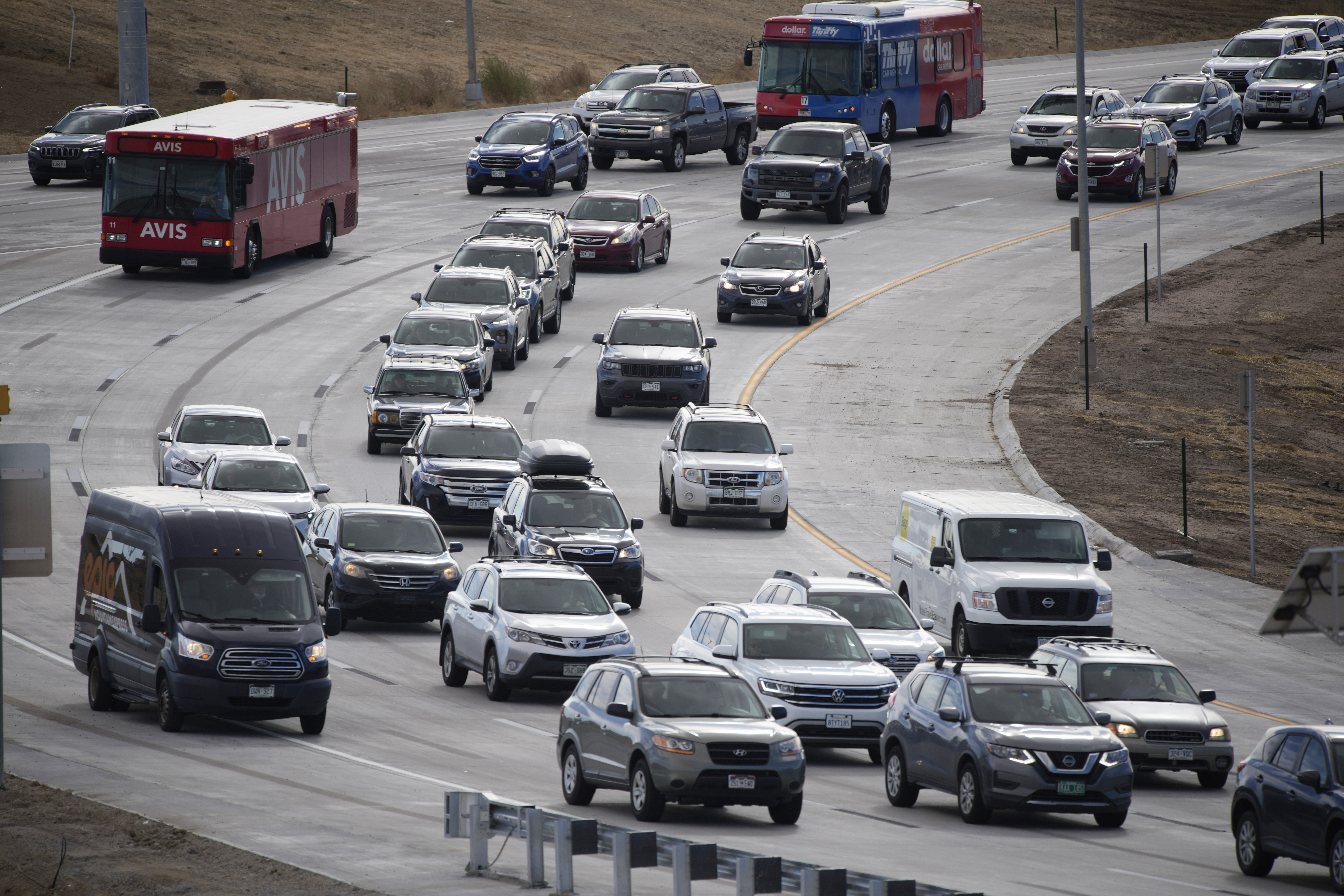 Photos: Thanksgiving travelers flock to airports, freeways ahead of holiday