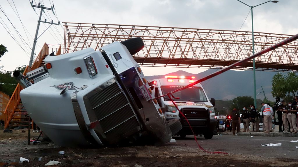 Photos: Mexico truck crash leaves dozens of migrants dead