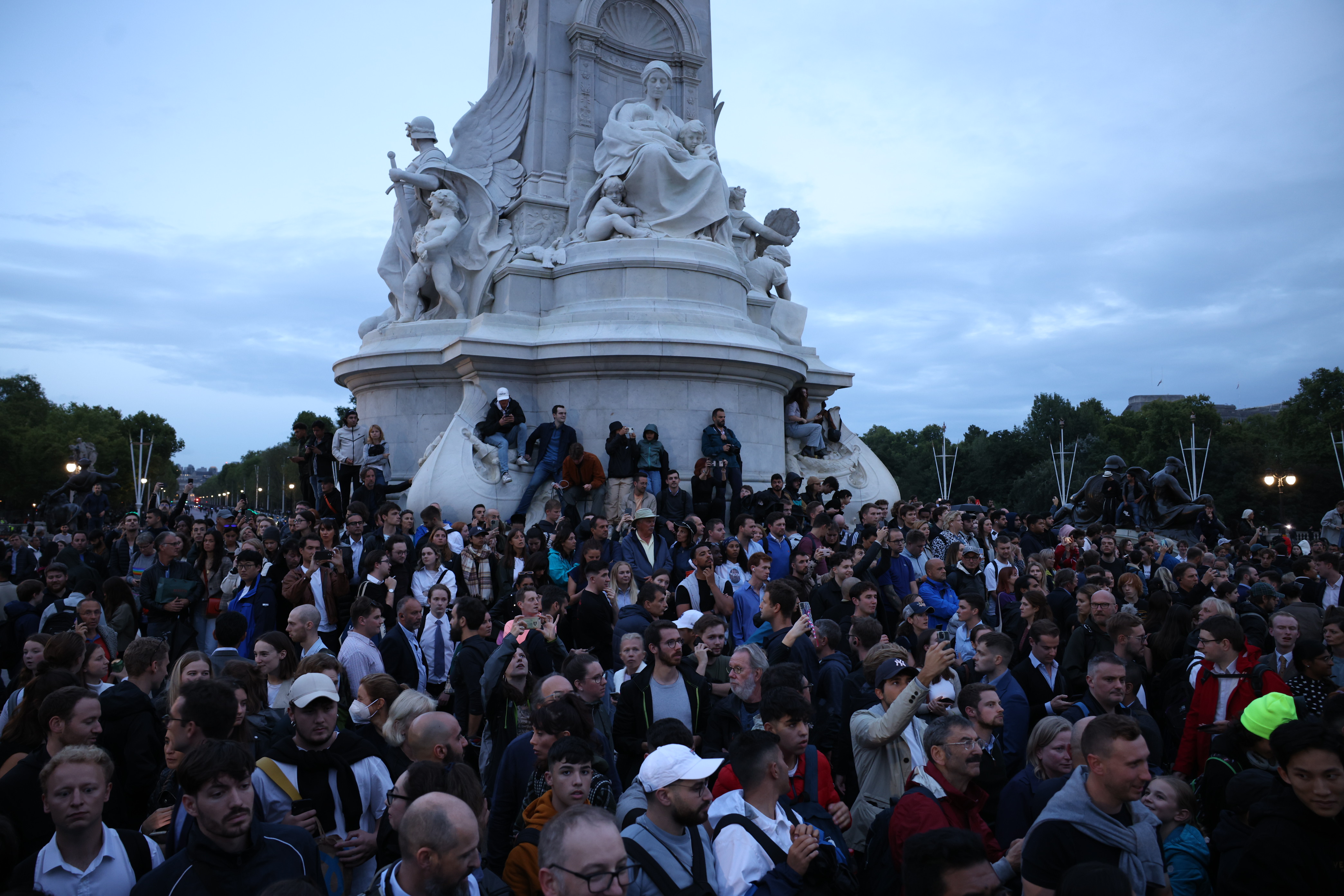 Public gathers at Buckingham Palace