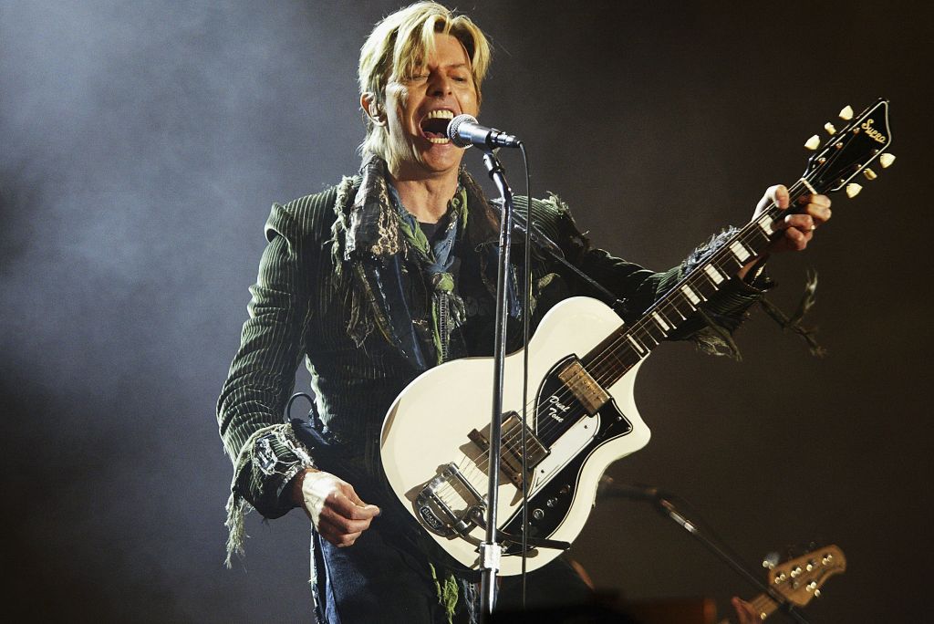 David Bowie performs on stage on the third and final day of "The Nokia Isle of Wight Festival 2004" at Seaclose Park