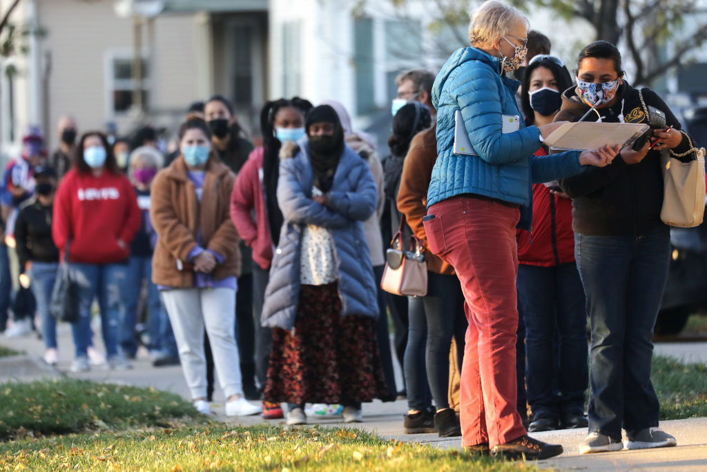 Iowans Wait In Line At Polling Stations On The Last Day Of Early Voting