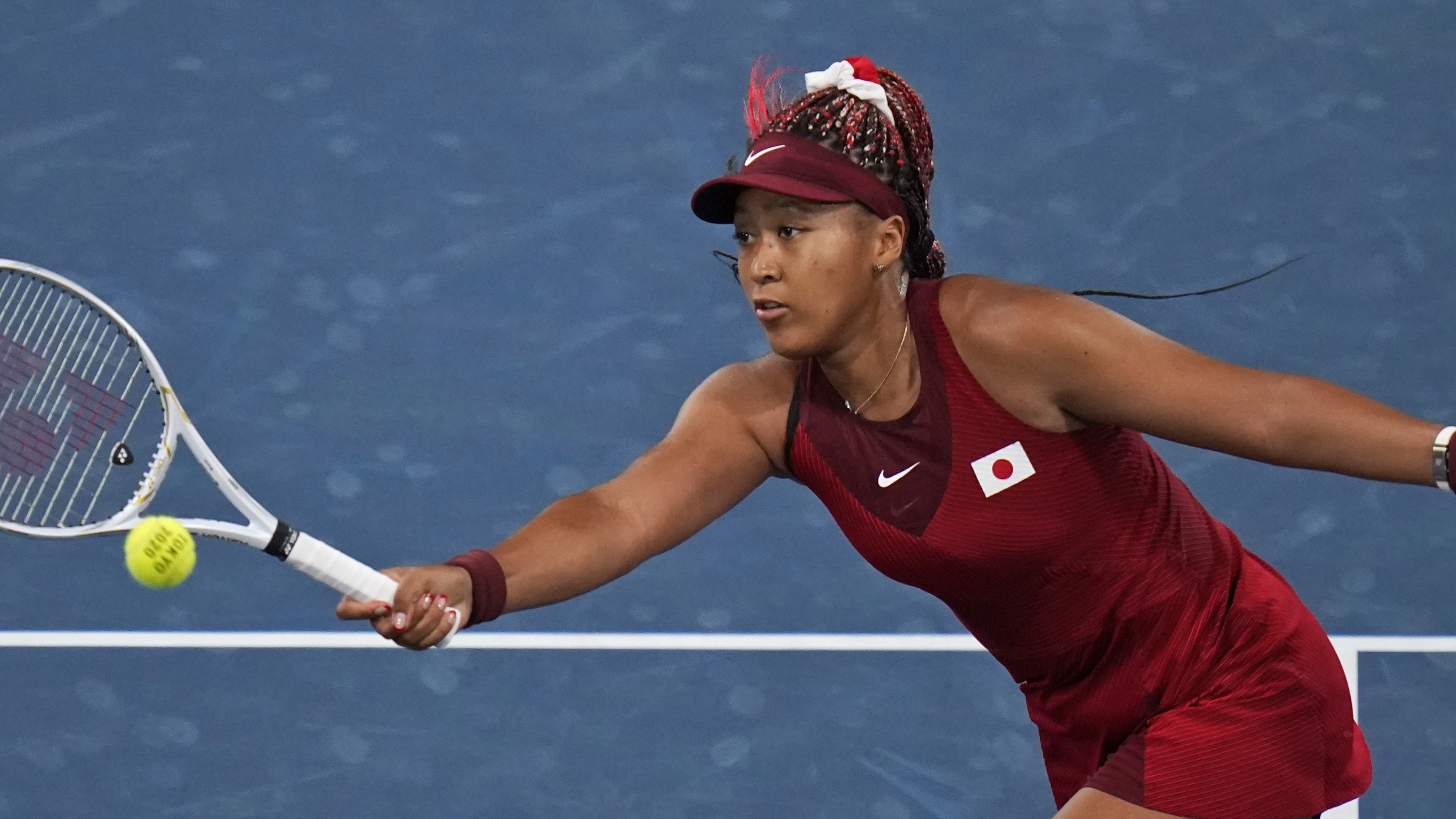 Photos: Naomi Osaka eliminated from Tokyo Olympics tennis tournament