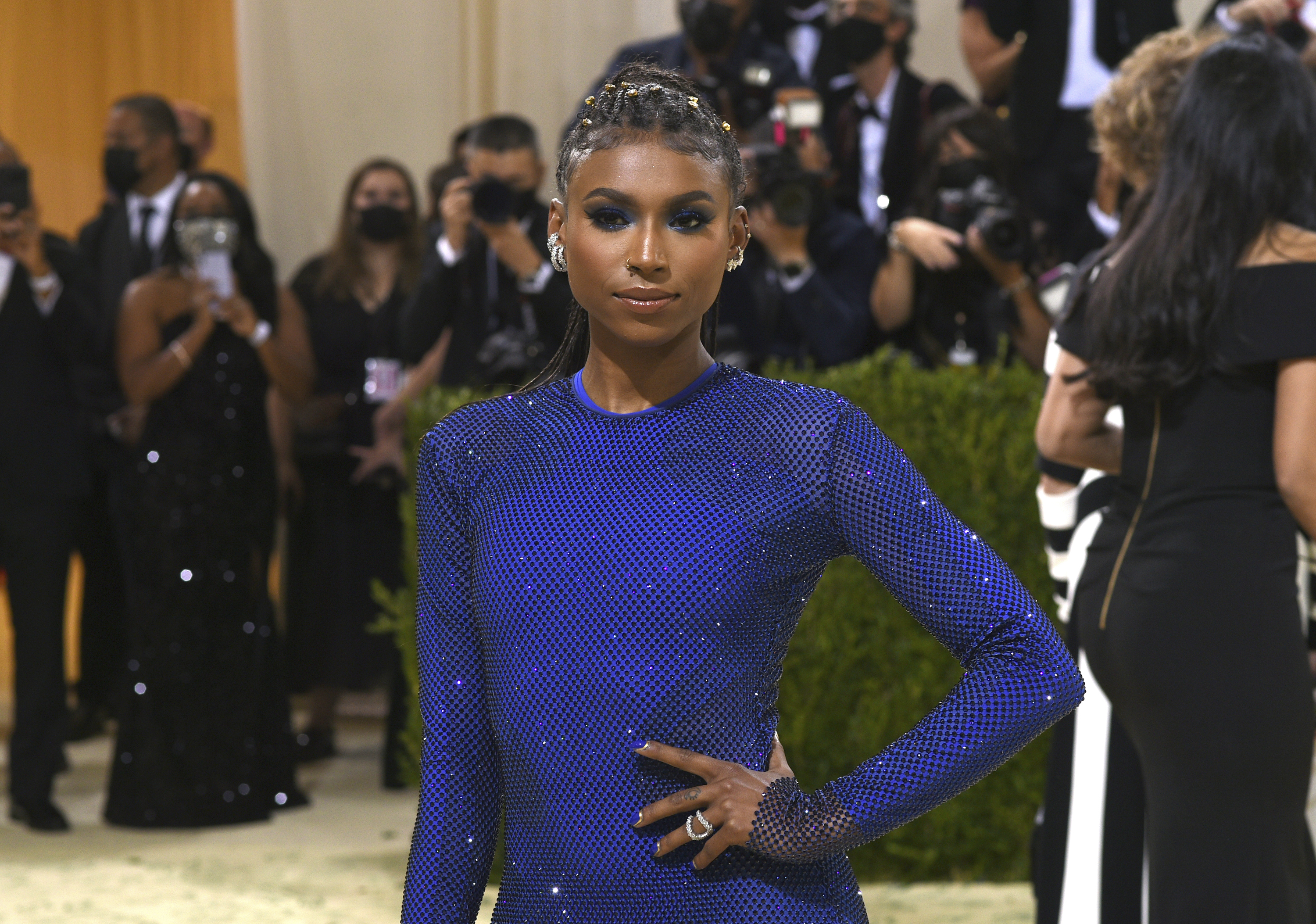 Photos: Gymnast Nia Dennis, marching band steal the show at Met Gala 2021