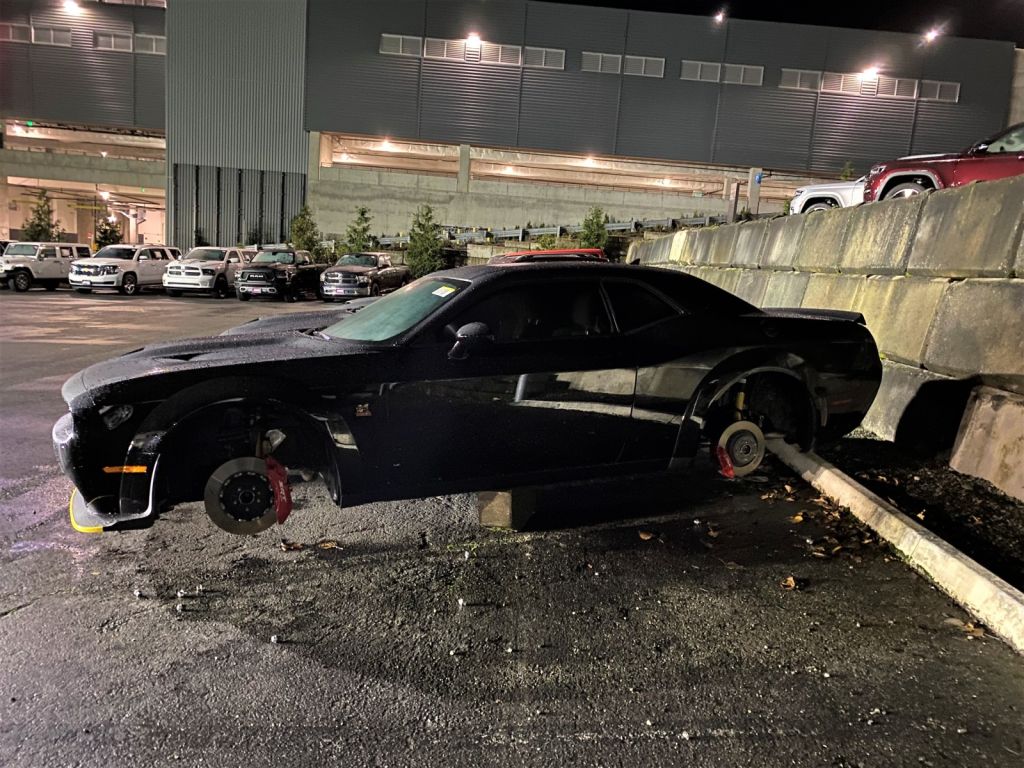 Police: Man stole tires, tried to flee while on a jack.