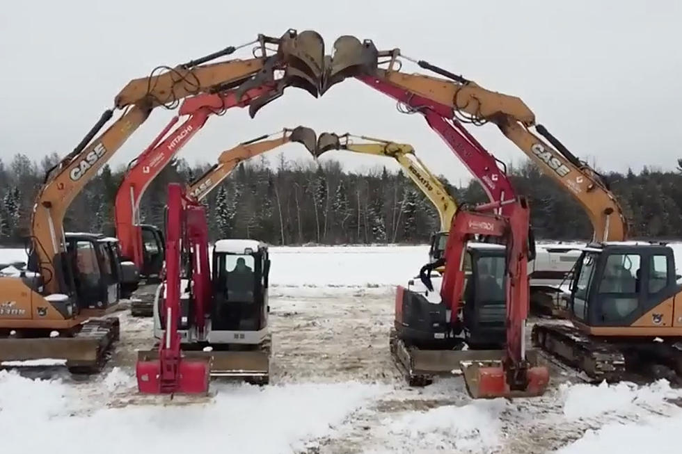 Backhoes' synchronized "dance" to Metallica.