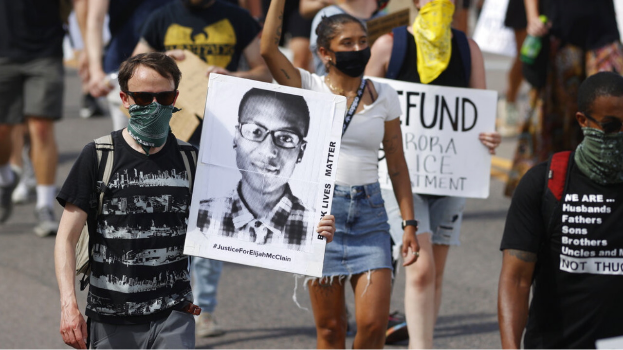 Firings upheld for 3 Colorado officers who posed in photo near Elijah McClain memorial