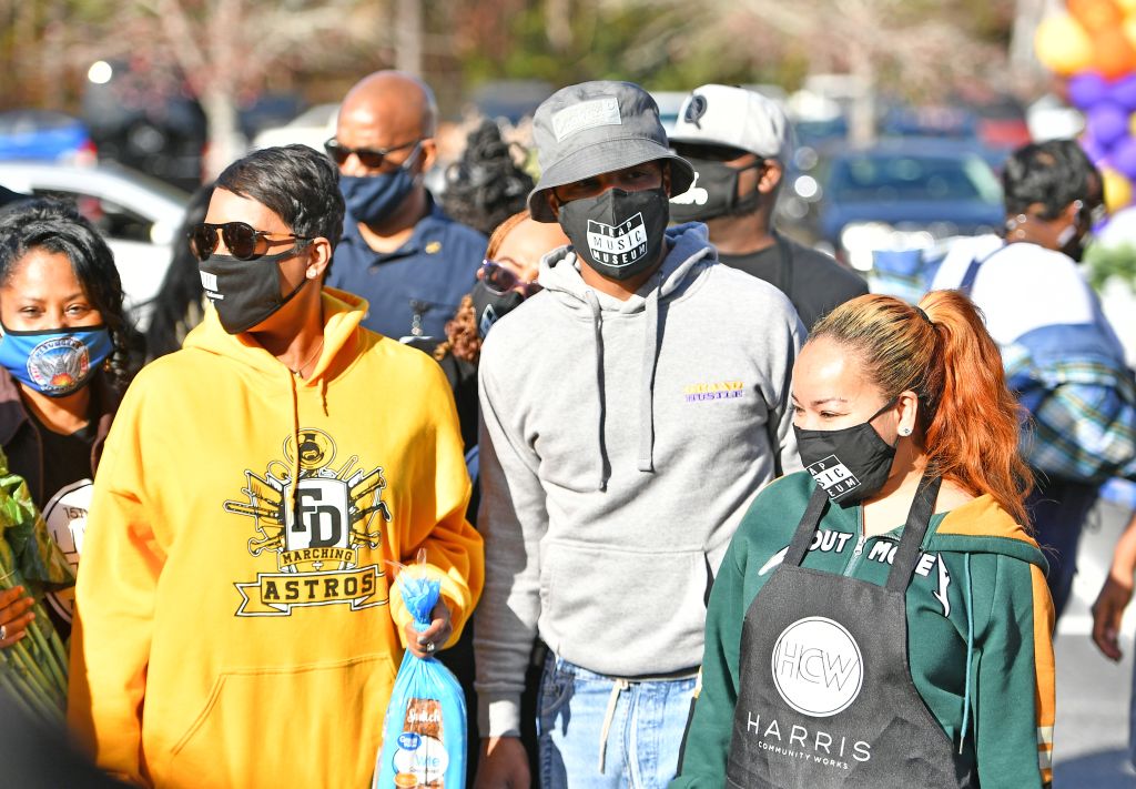 Rapper T.I. gives 1,000 Thanksgiving turkeys to families in need at Atlanta event