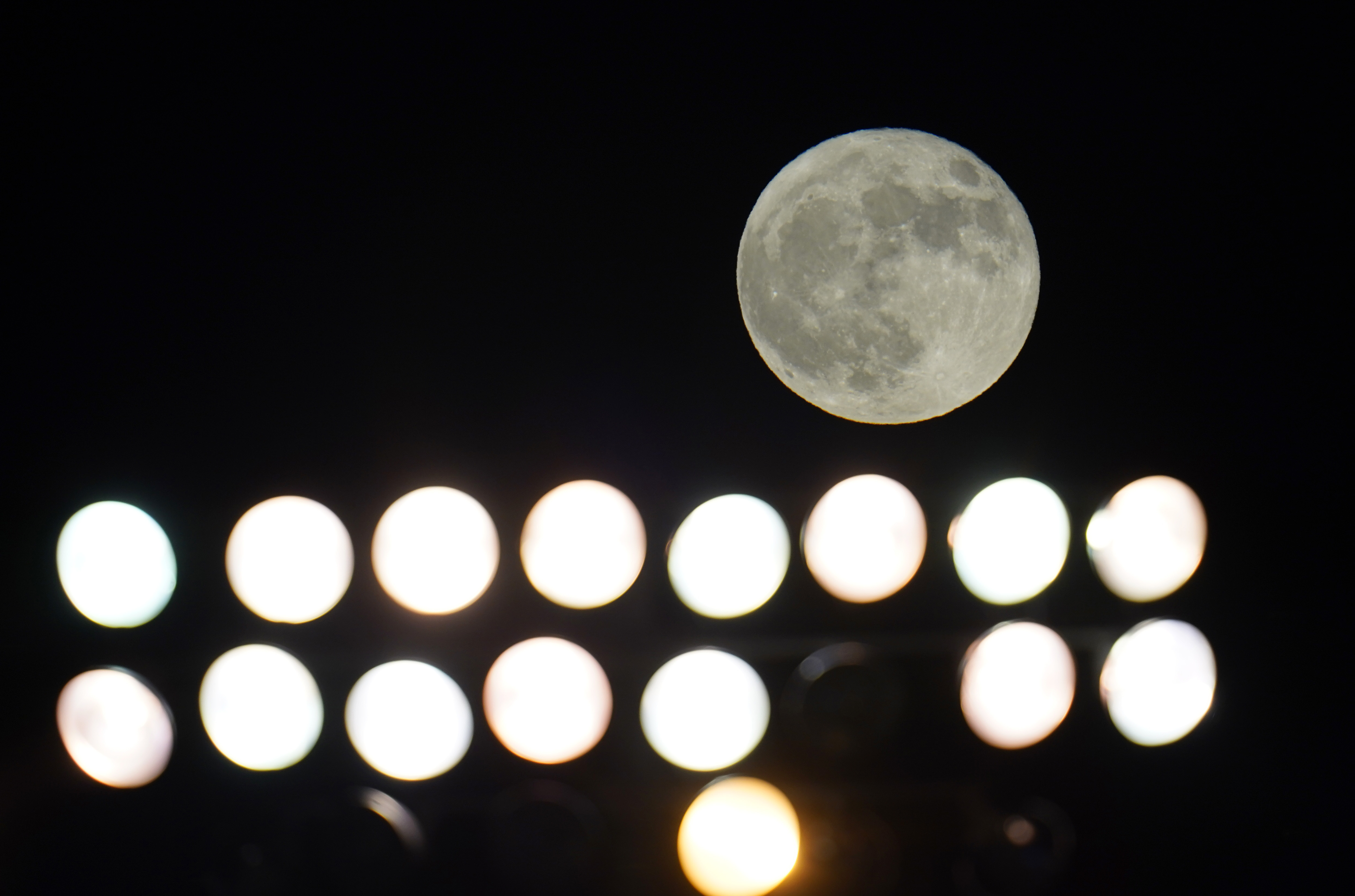 Photos: Halloween Blue Moon brightens the night sky