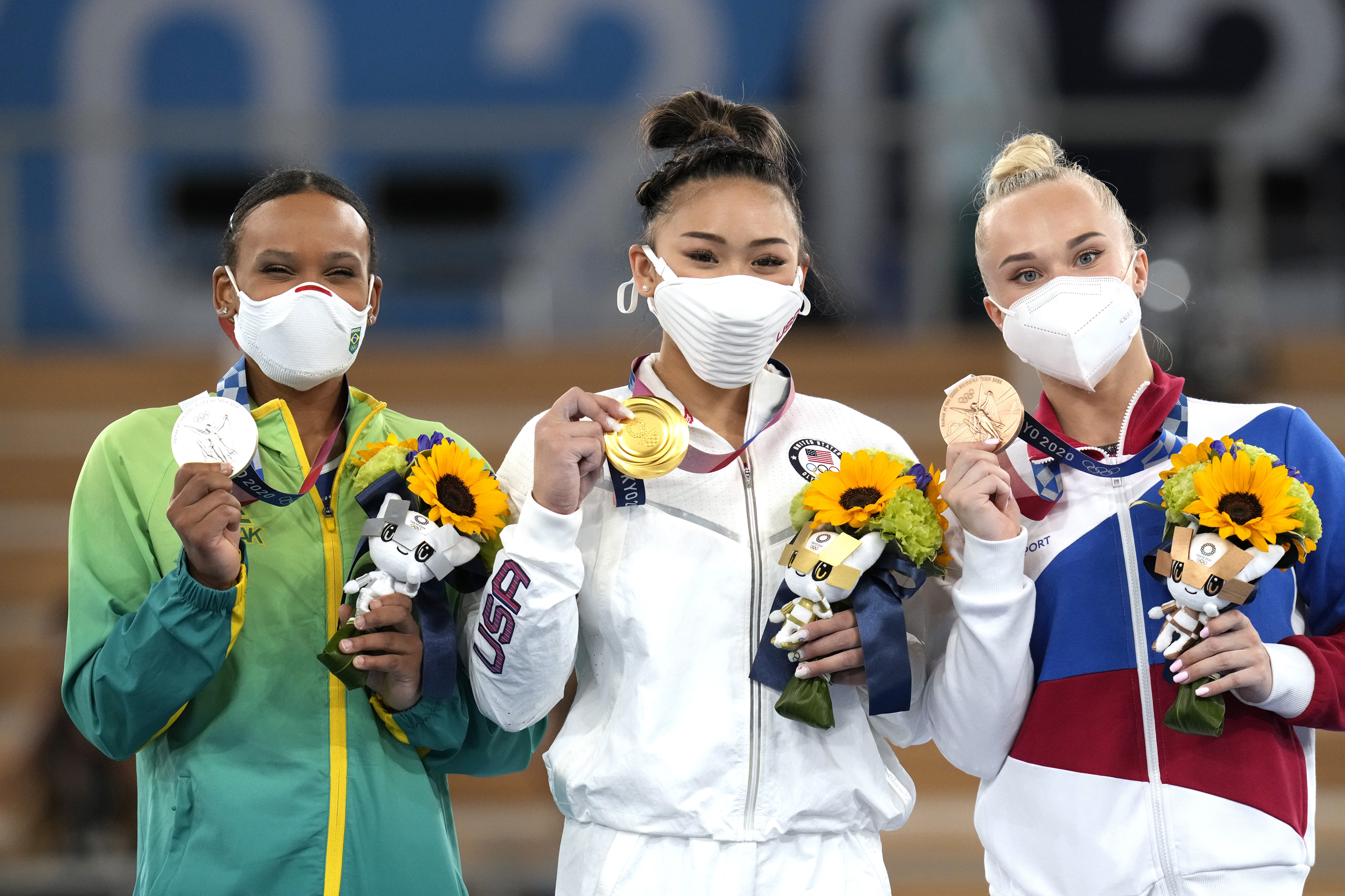 Photos: Sunisa Lee wins gold in Olympic gymnastics all-around