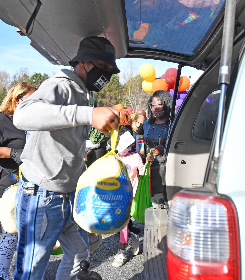 Rapper T.I. gives 1,000 Thanksgiving turkeys to families in need at Atlanta event