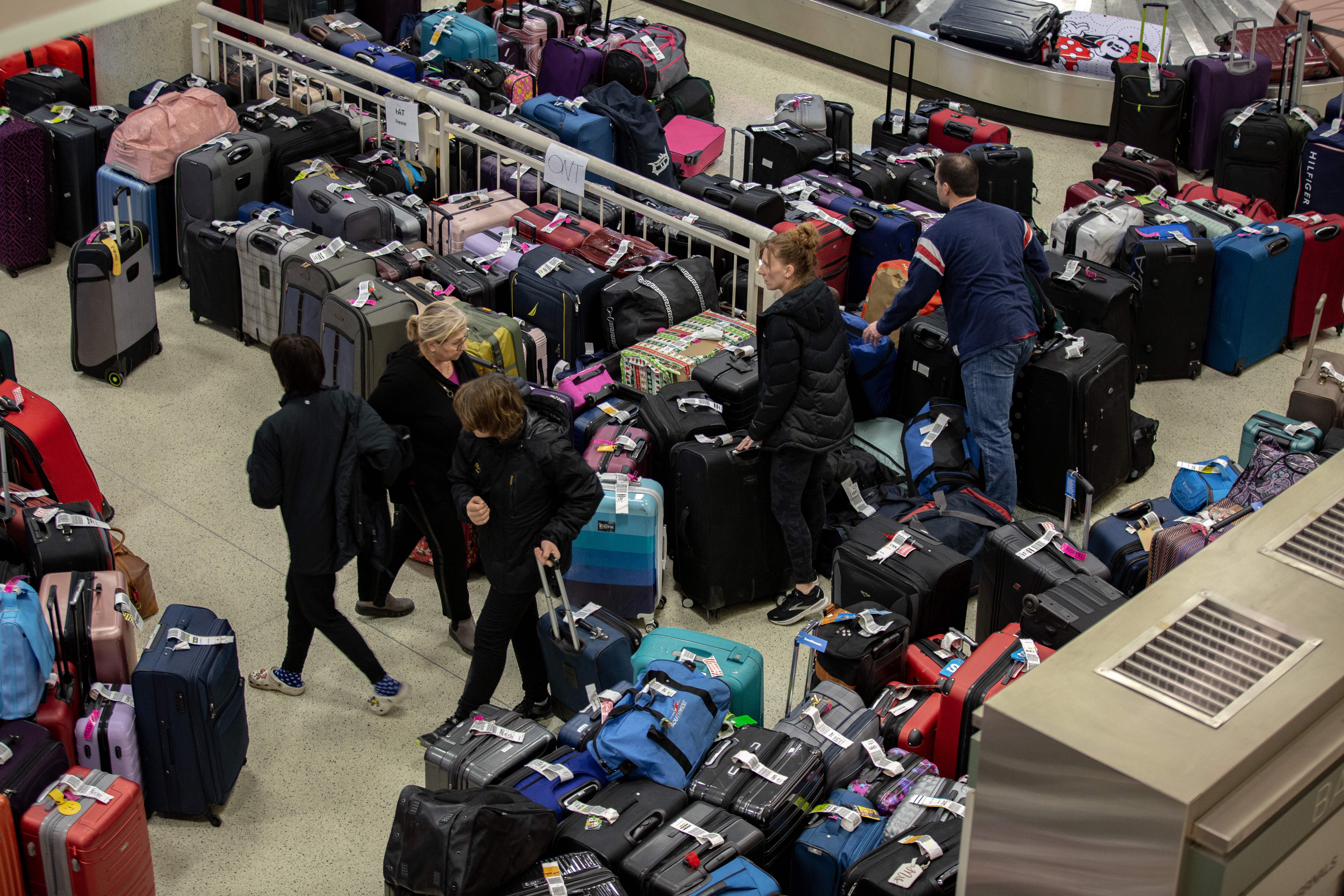 Passengers stranded, bags pile up as Southwest cancels flights