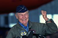 Chuck Yeager Raising Fist at Press Conference