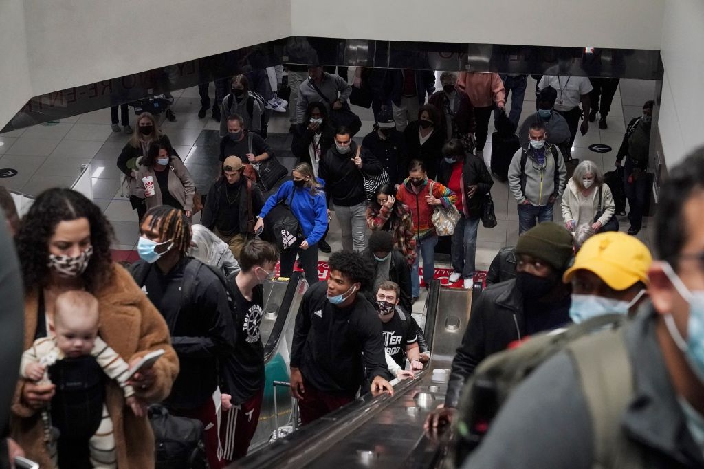 Photos: Thanksgiving travelers flock to airports, freeways ahead of holiday