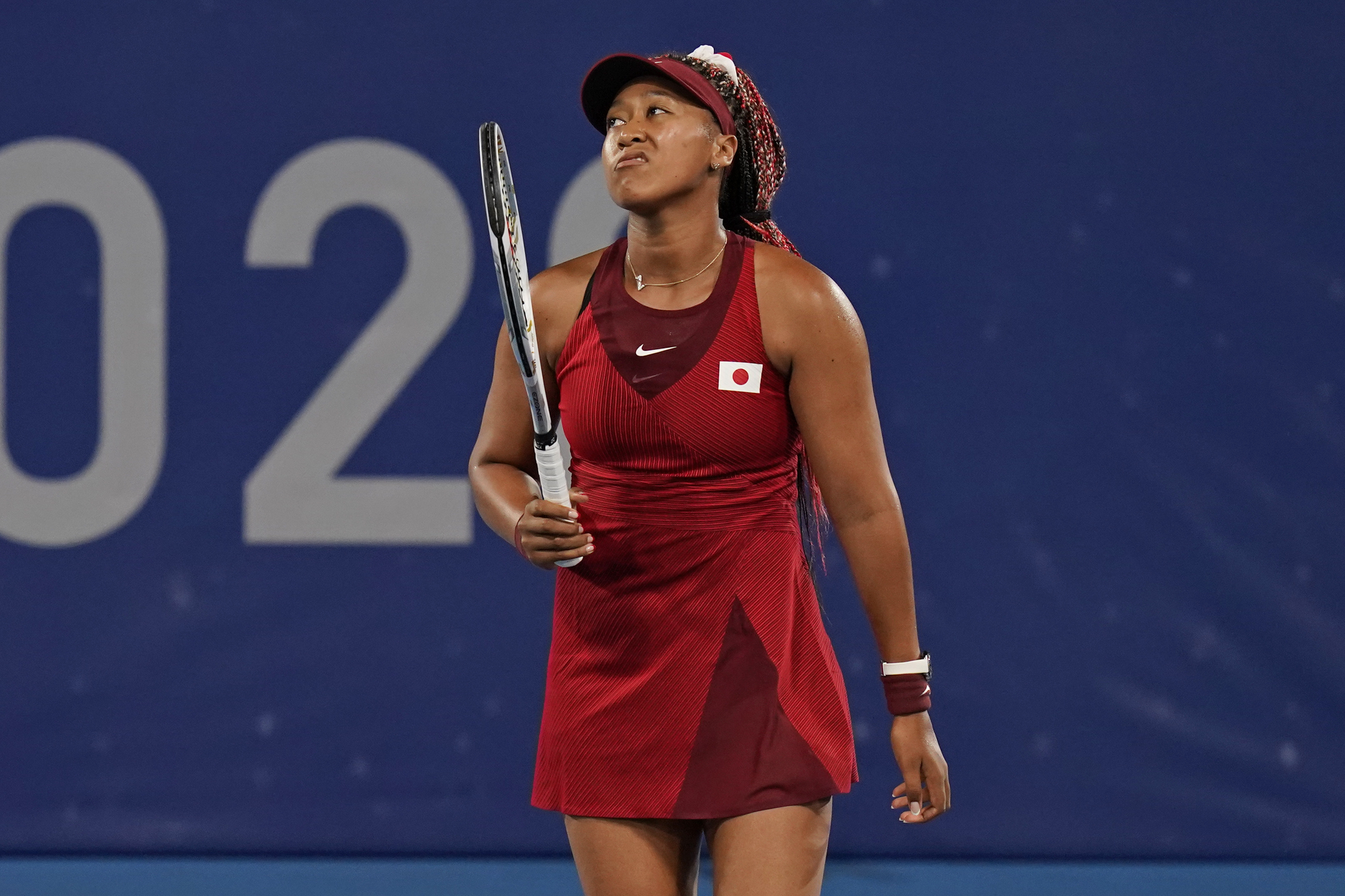 Photos: Naomi Osaka eliminated from Tokyo Olympics tennis tournament