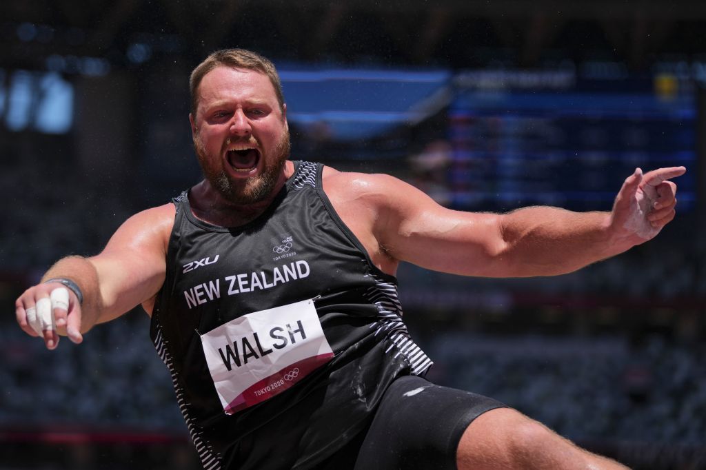Photos: Ryan Crouser wins Olympic gold, sets record in shot put