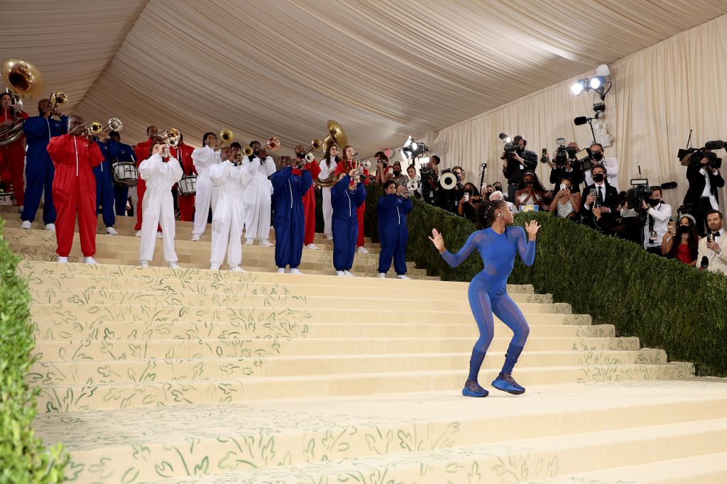 Photos: Gymnast Nia Dennis, marching band steal the show at Met Gala 2021