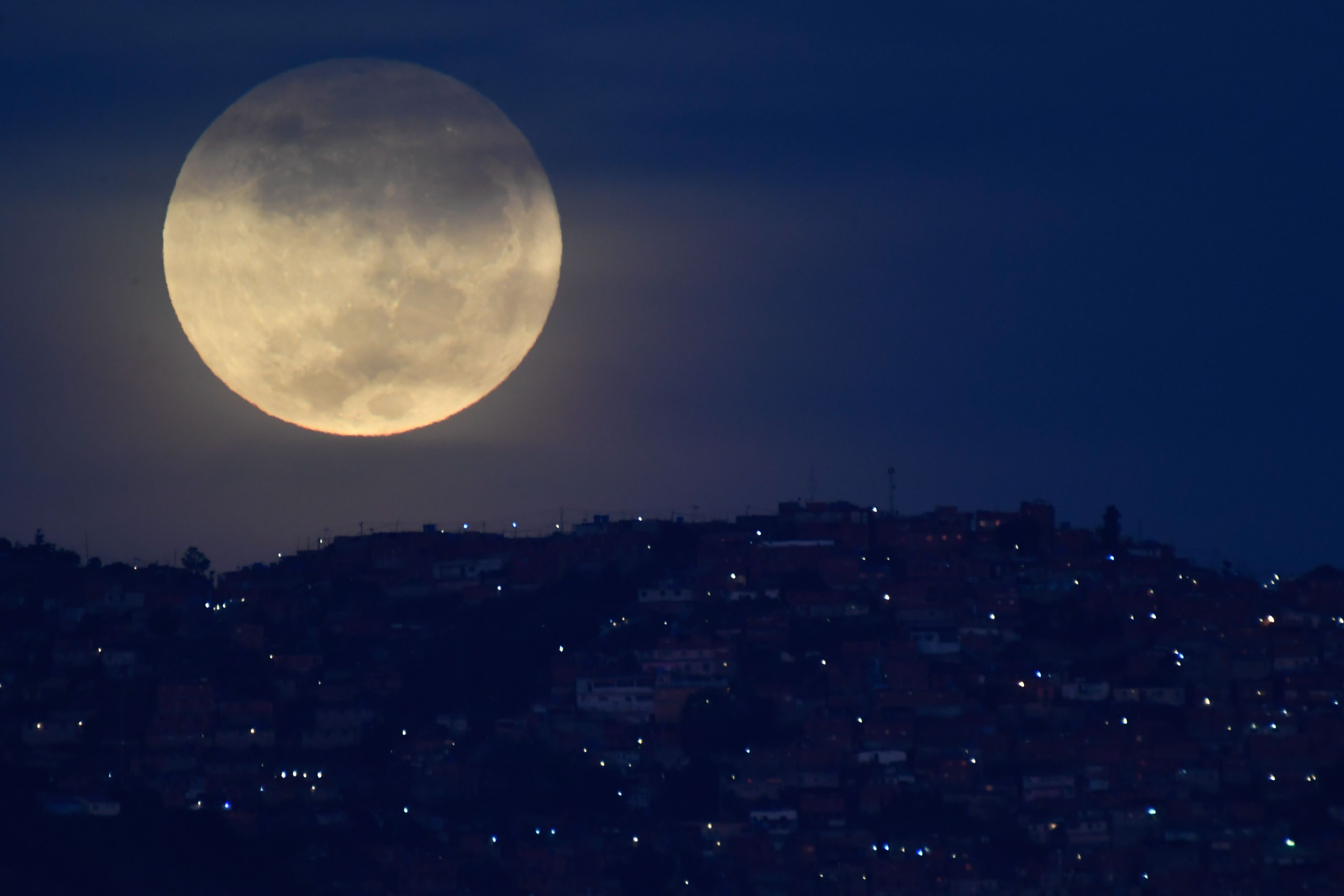 Photos: Halloween Blue Moon brightens the night sky