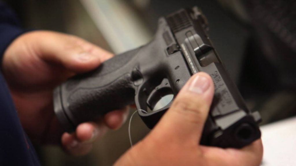 Florida school security monitor accused of bringing gun to campus