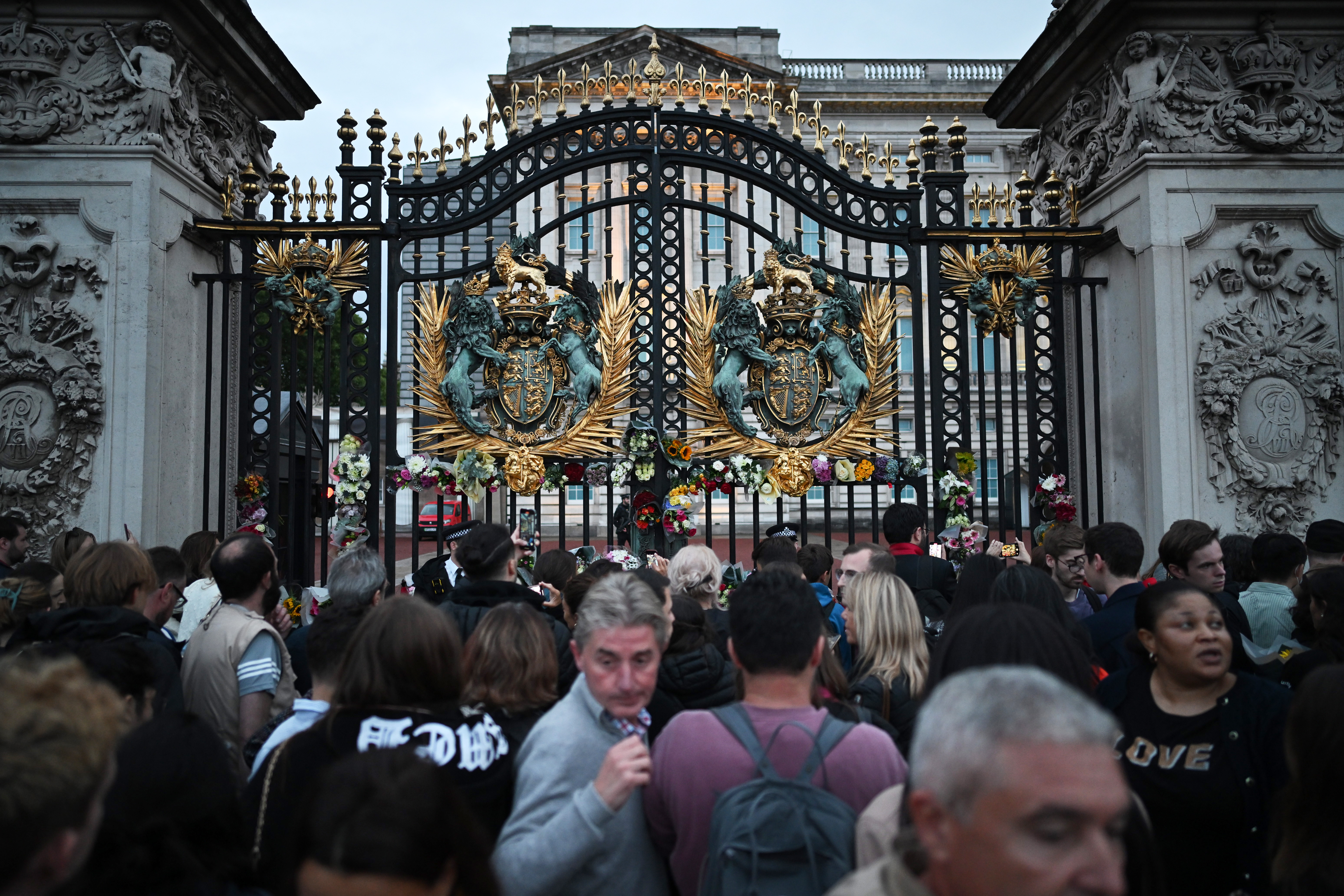 Public gathers at Buckingham Palace