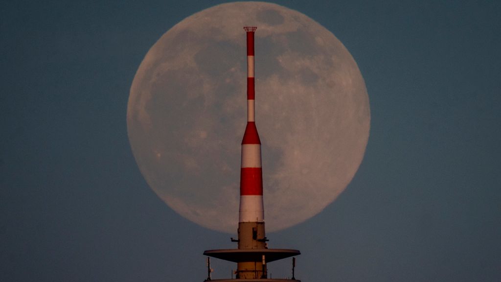 Photos: Super Pink Moon, April's full moon, brightens the night sky