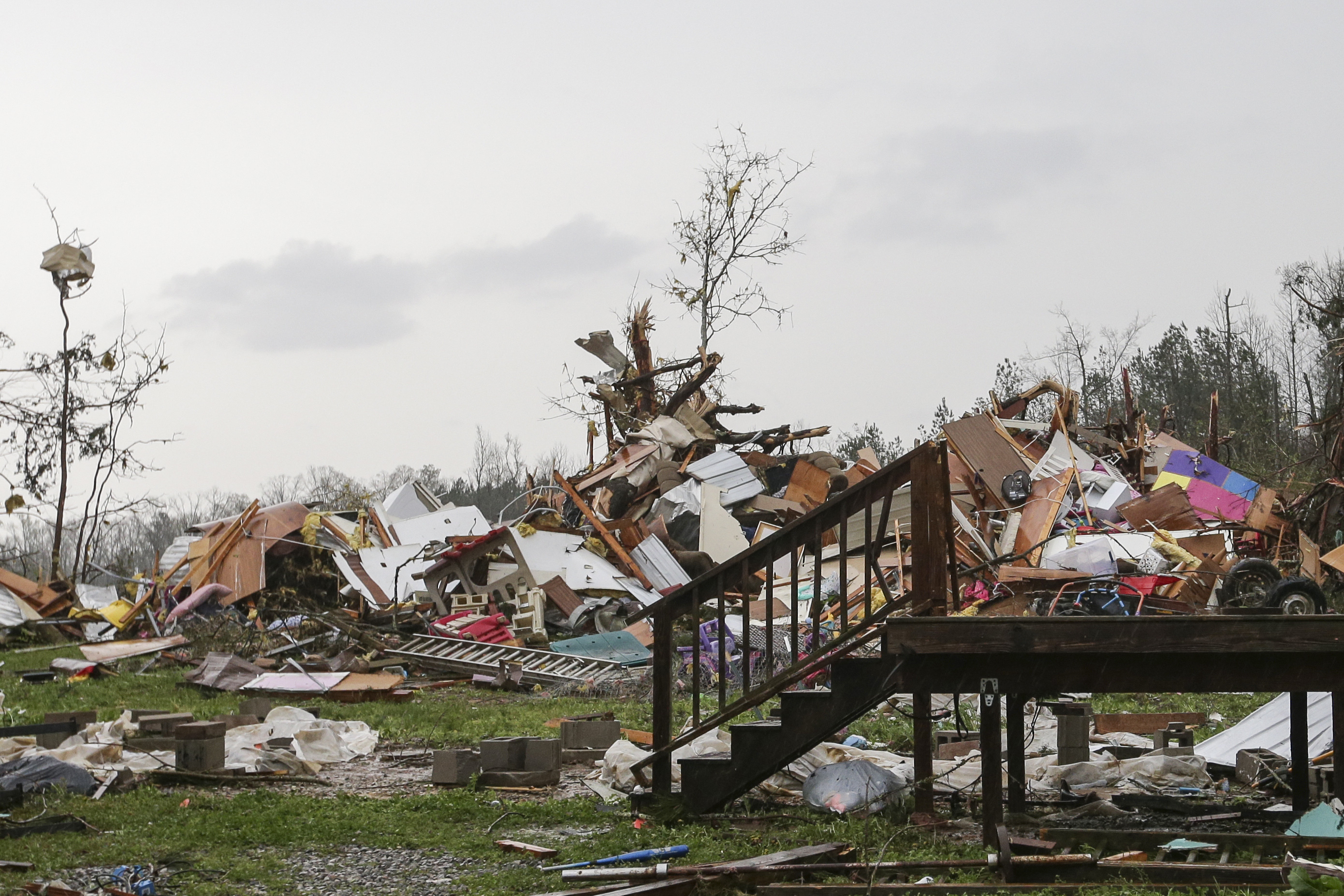 Photos: Deadly tornadoes, storms sweep through Deep South