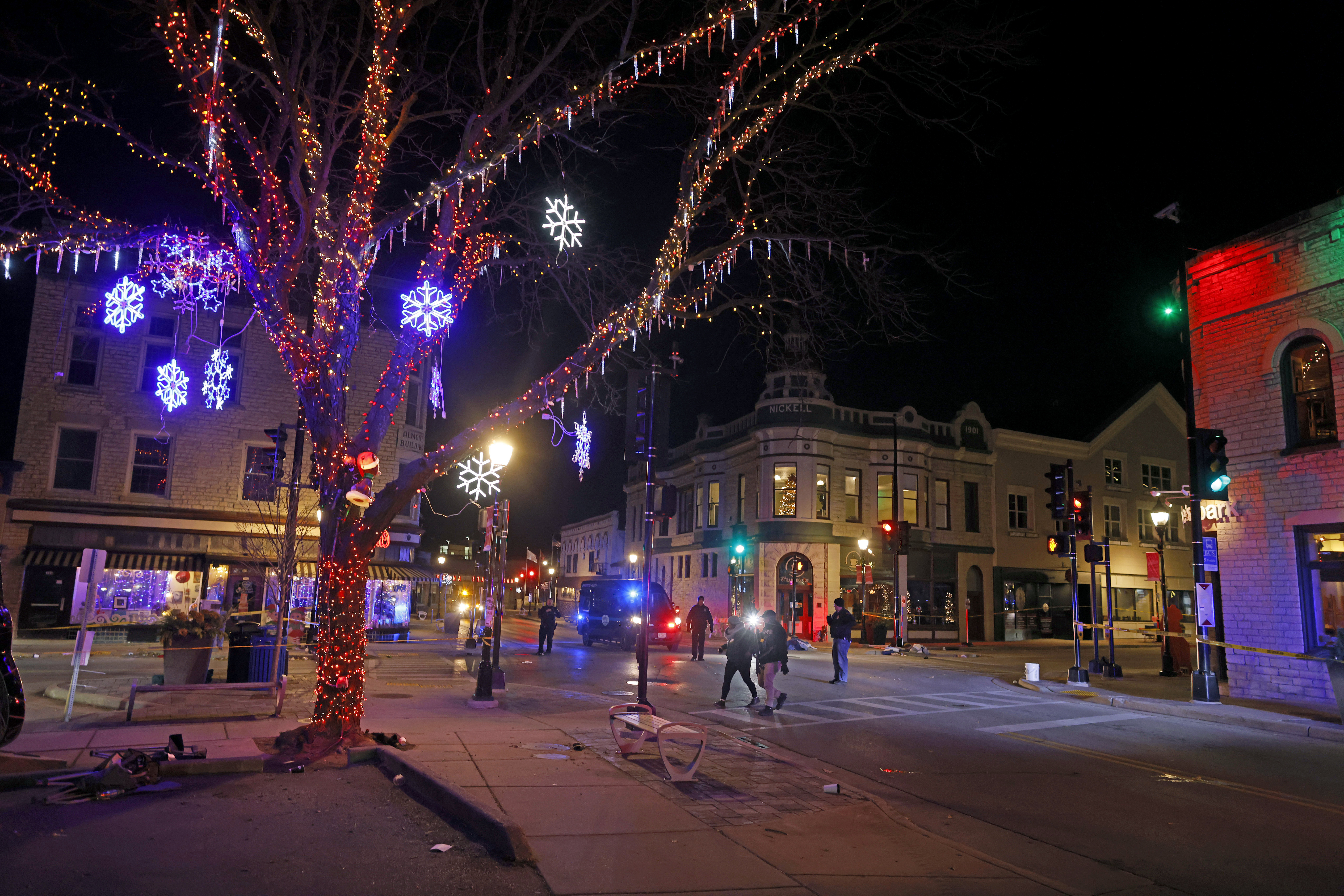 Photos: 5 dead, dozens hurt after SUV plows into Wisconsin holiday parade