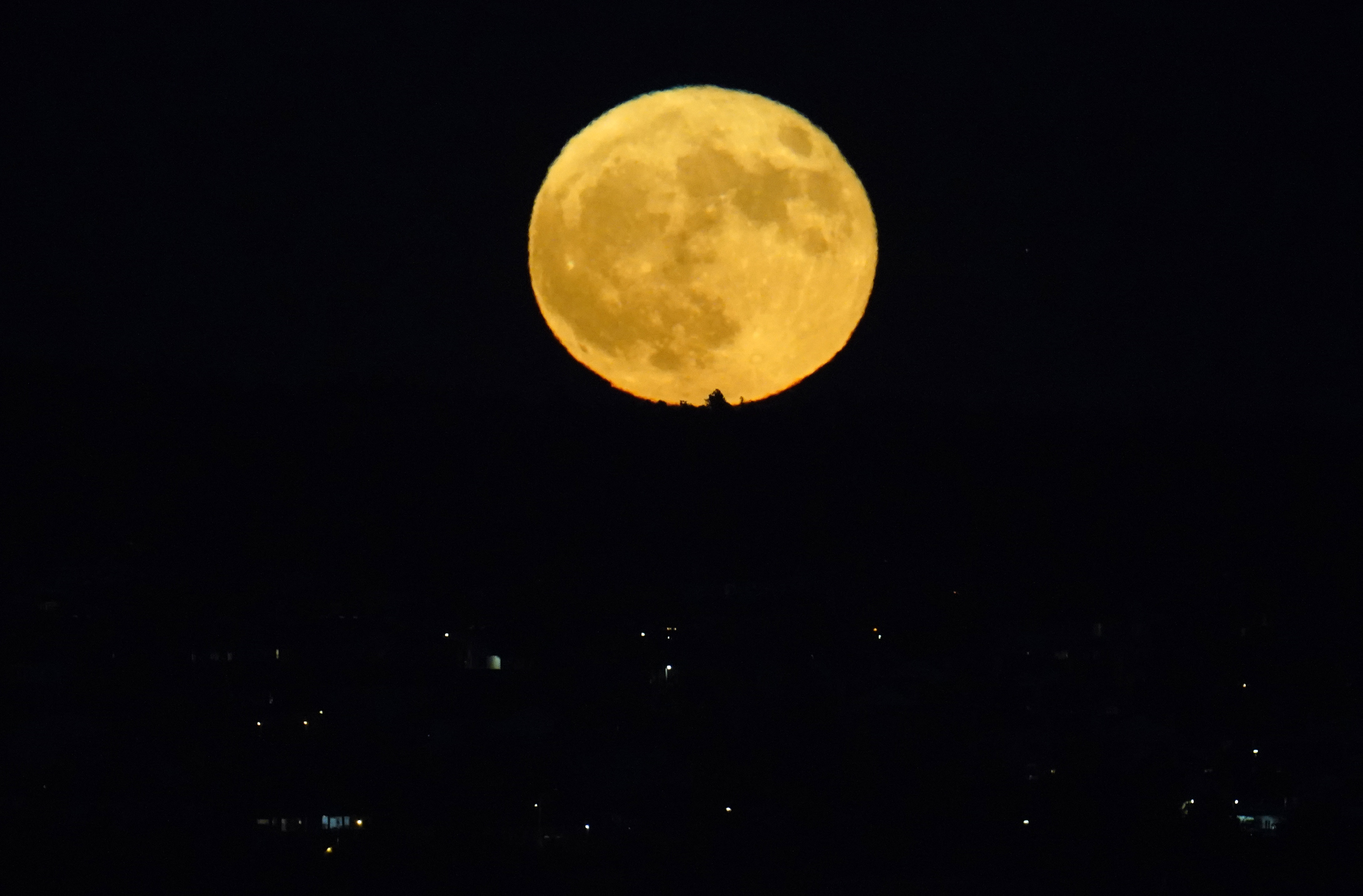 Photos: Halloween Blue Moon brightens the night sky