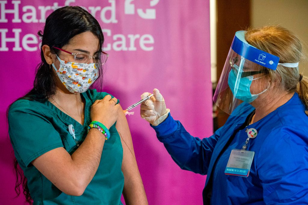 Photos: First Americans vaccinated against COVID-19 receive second dose