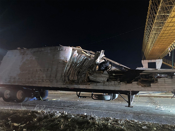 Photos: Mexico truck crash leaves dozens of migrants dead