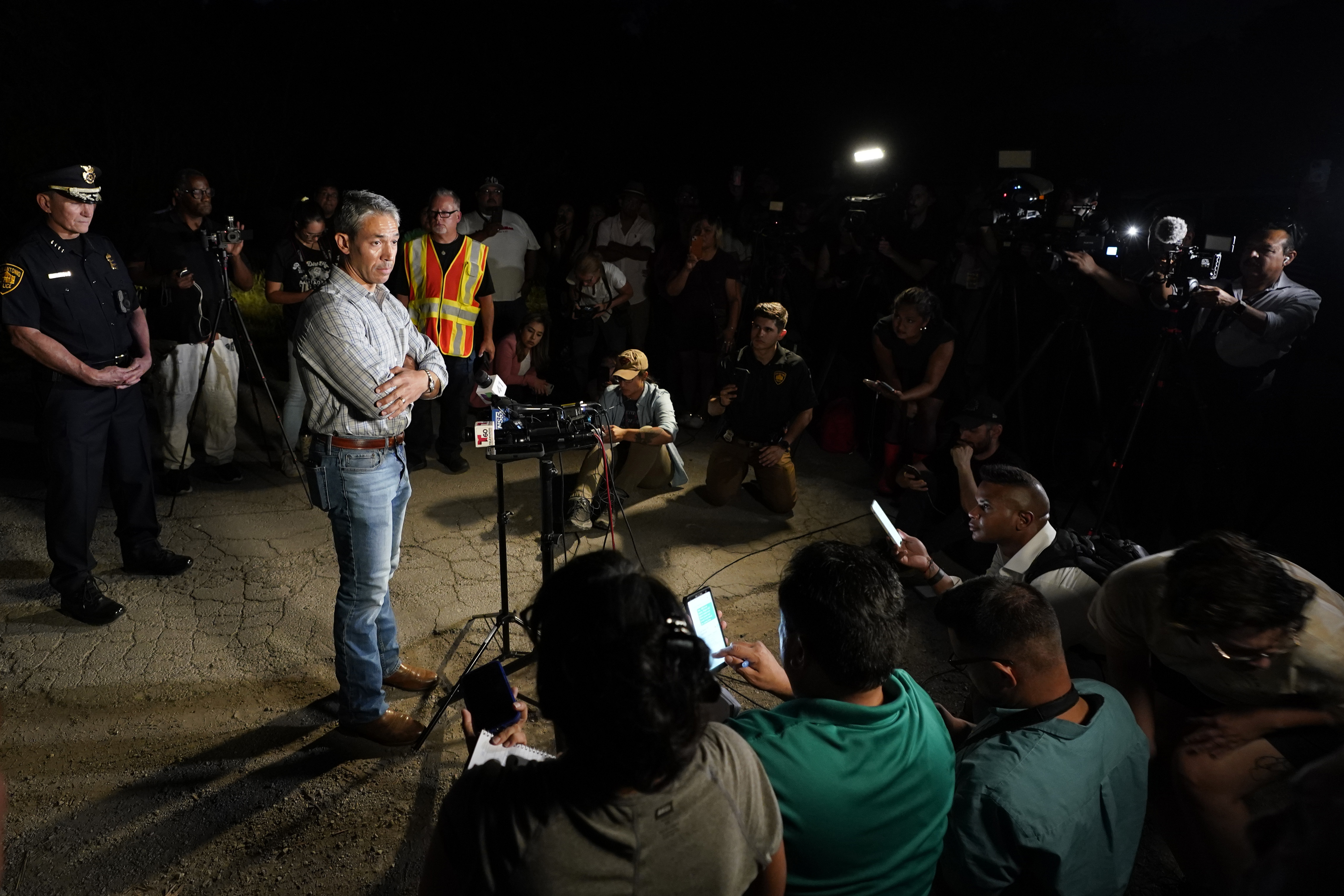 Photos: Dozens of suspected migrants found dead inside big-rig in San Antonio