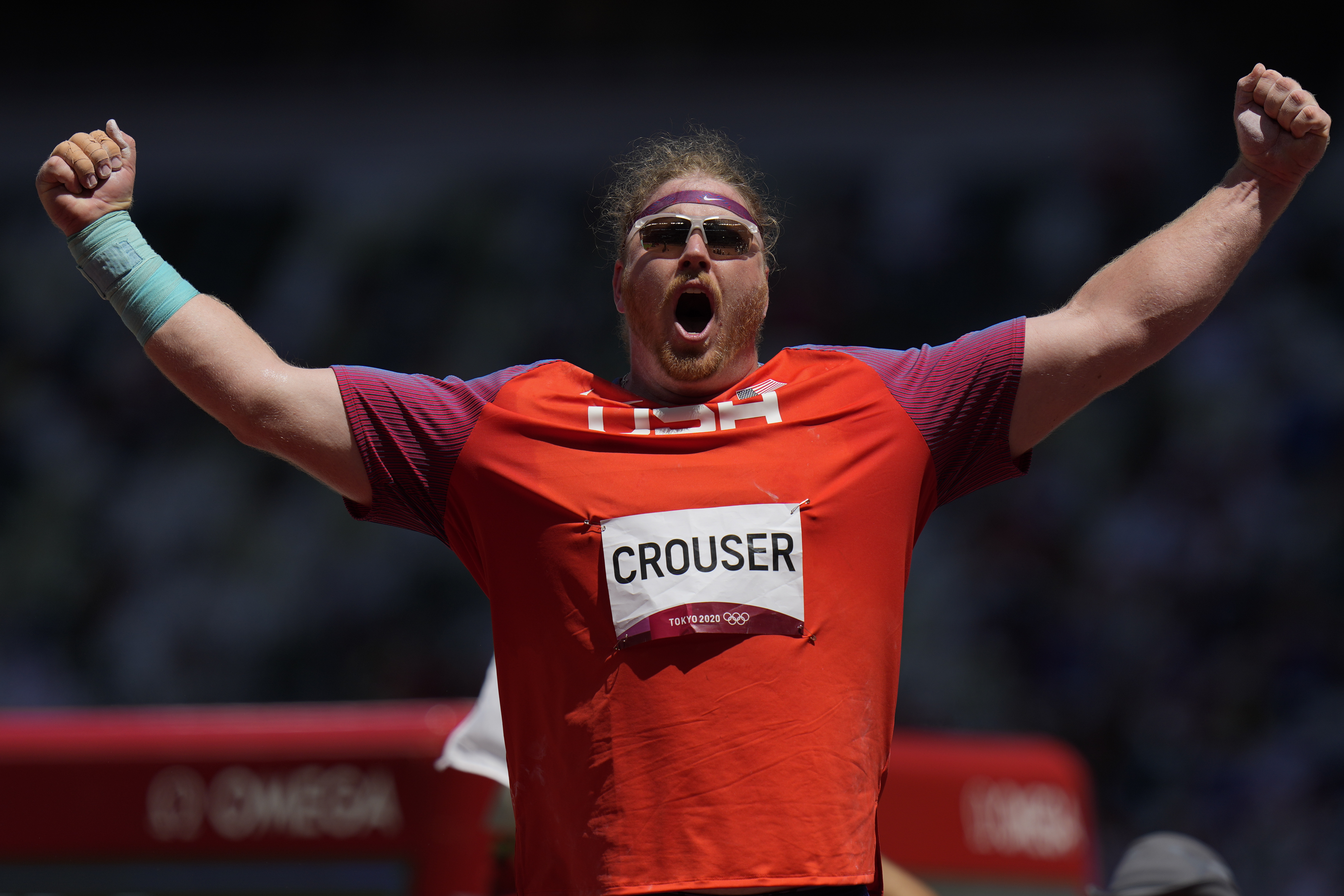 Photos: Ryan Crouser wins Olympic gold, sets record in shot put