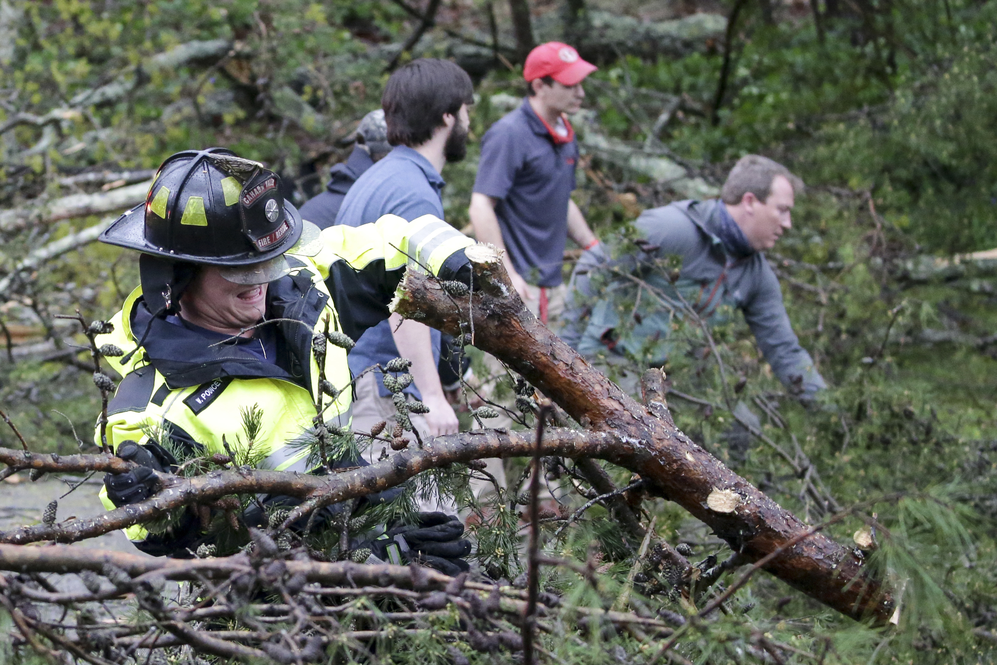 Photos: Deadly tornadoes, storms sweep through Deep South