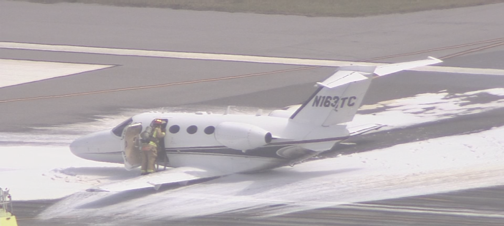 Caught on video: Sparks fly as jet skids down runway during emergency landing