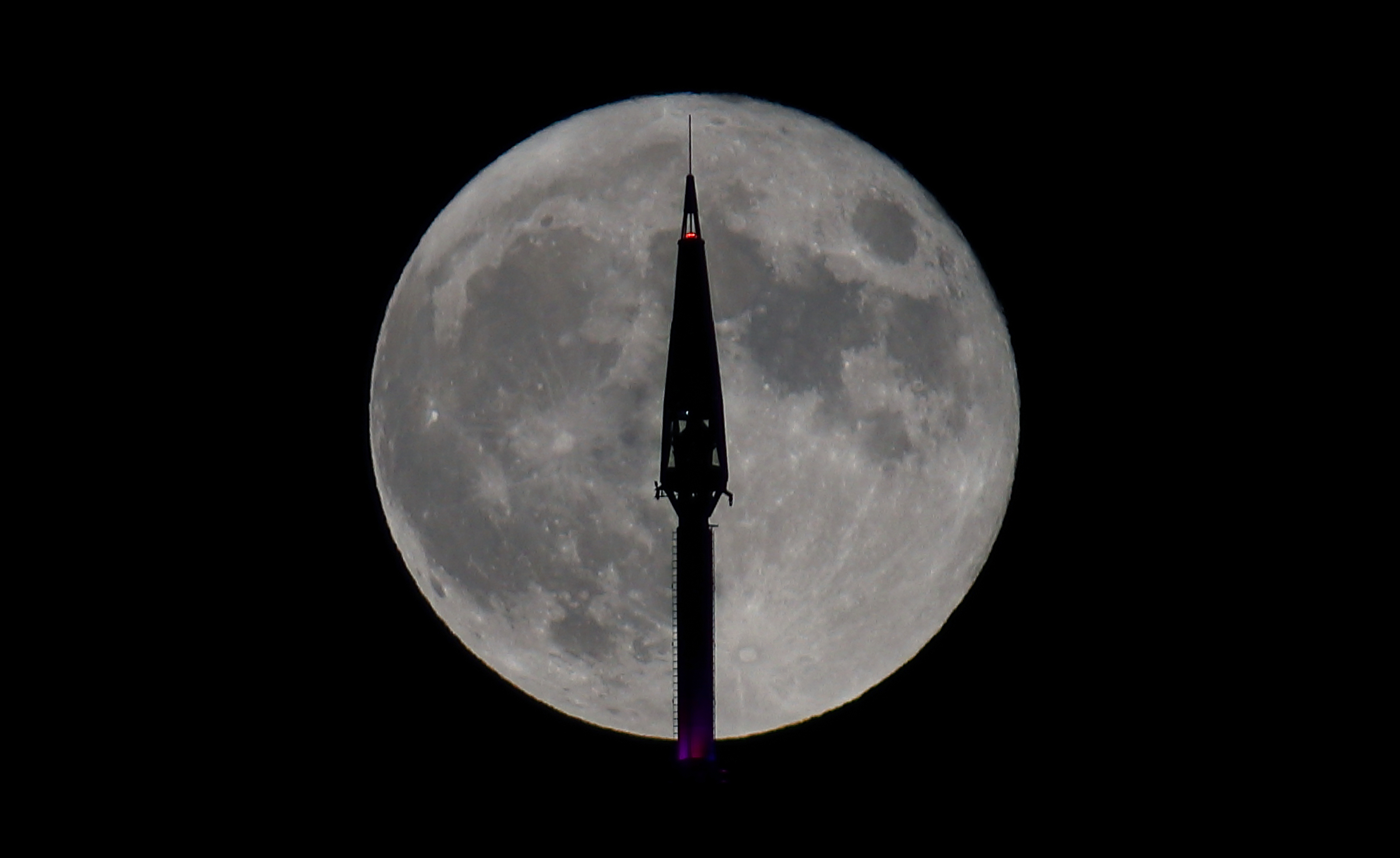 Photos: June 2021 Strawberry Moon brightens the night sky