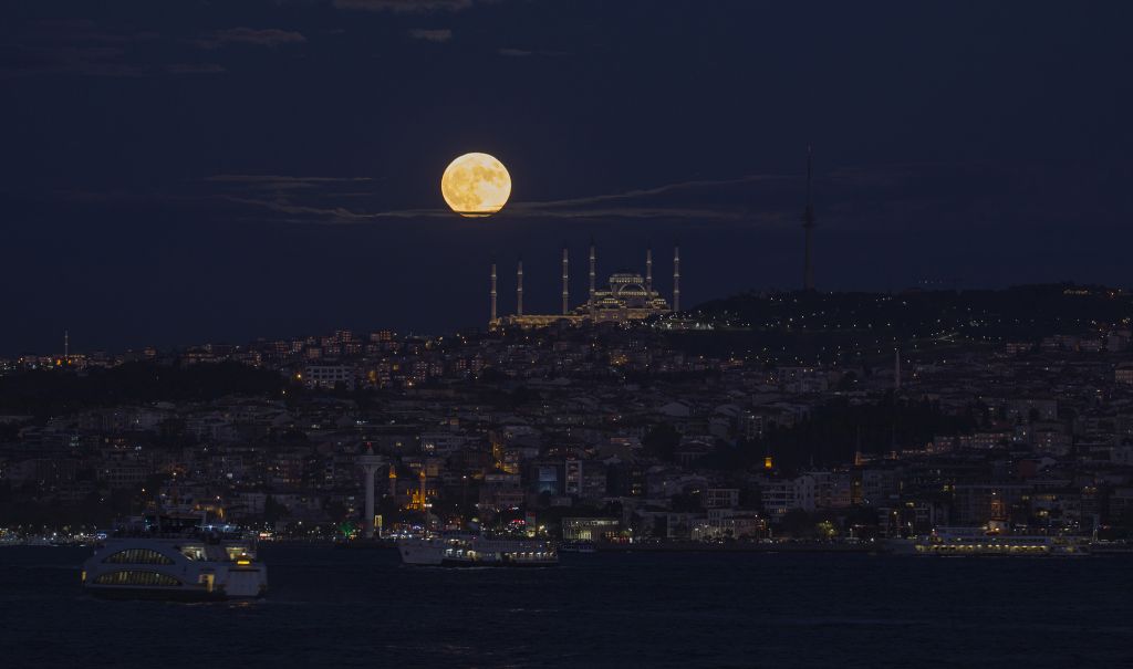 Photos: Halloween Blue Moon brightens the night sky
