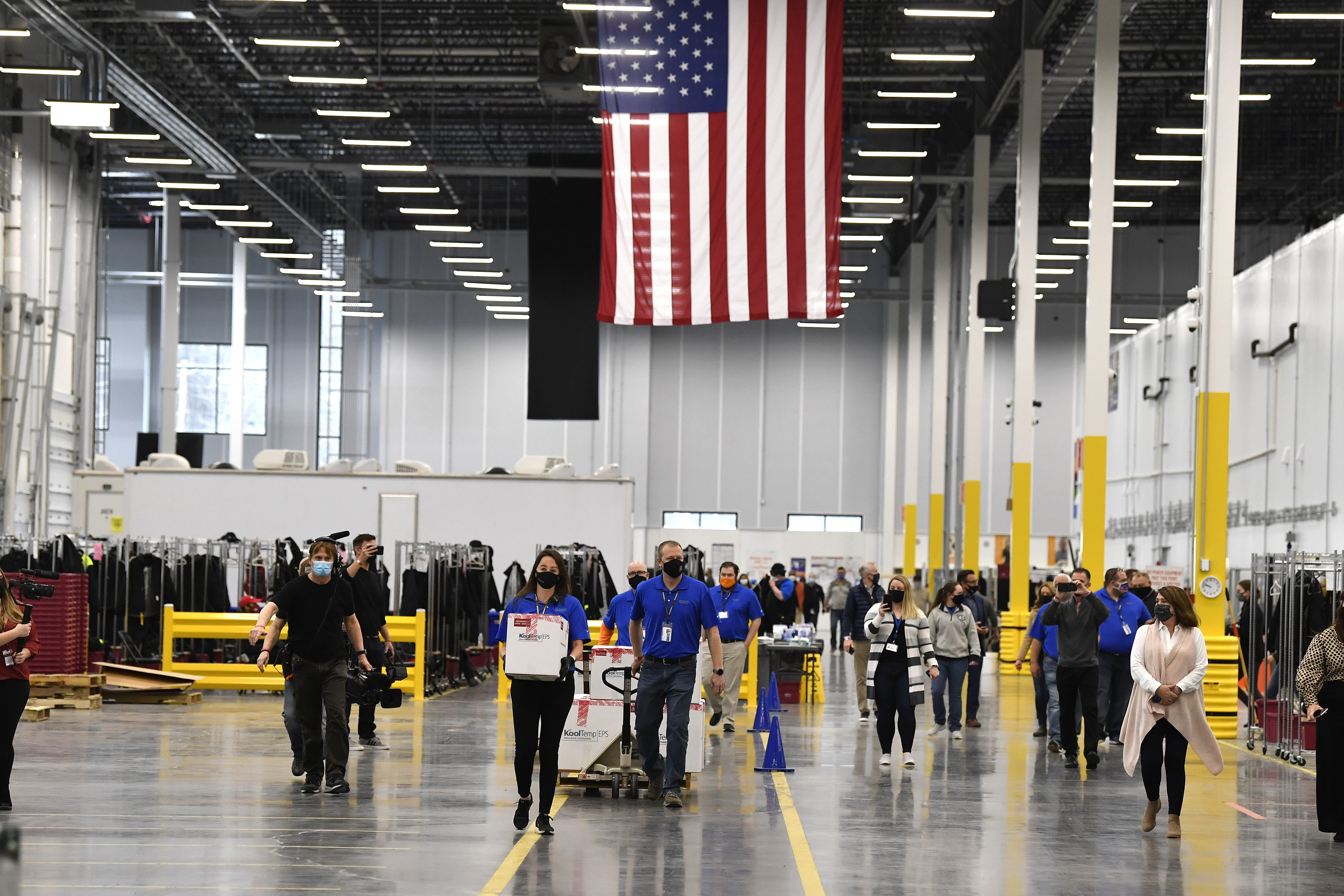 Photos: Johnson & Johnson ships millions of doses of coronavirus vaccine