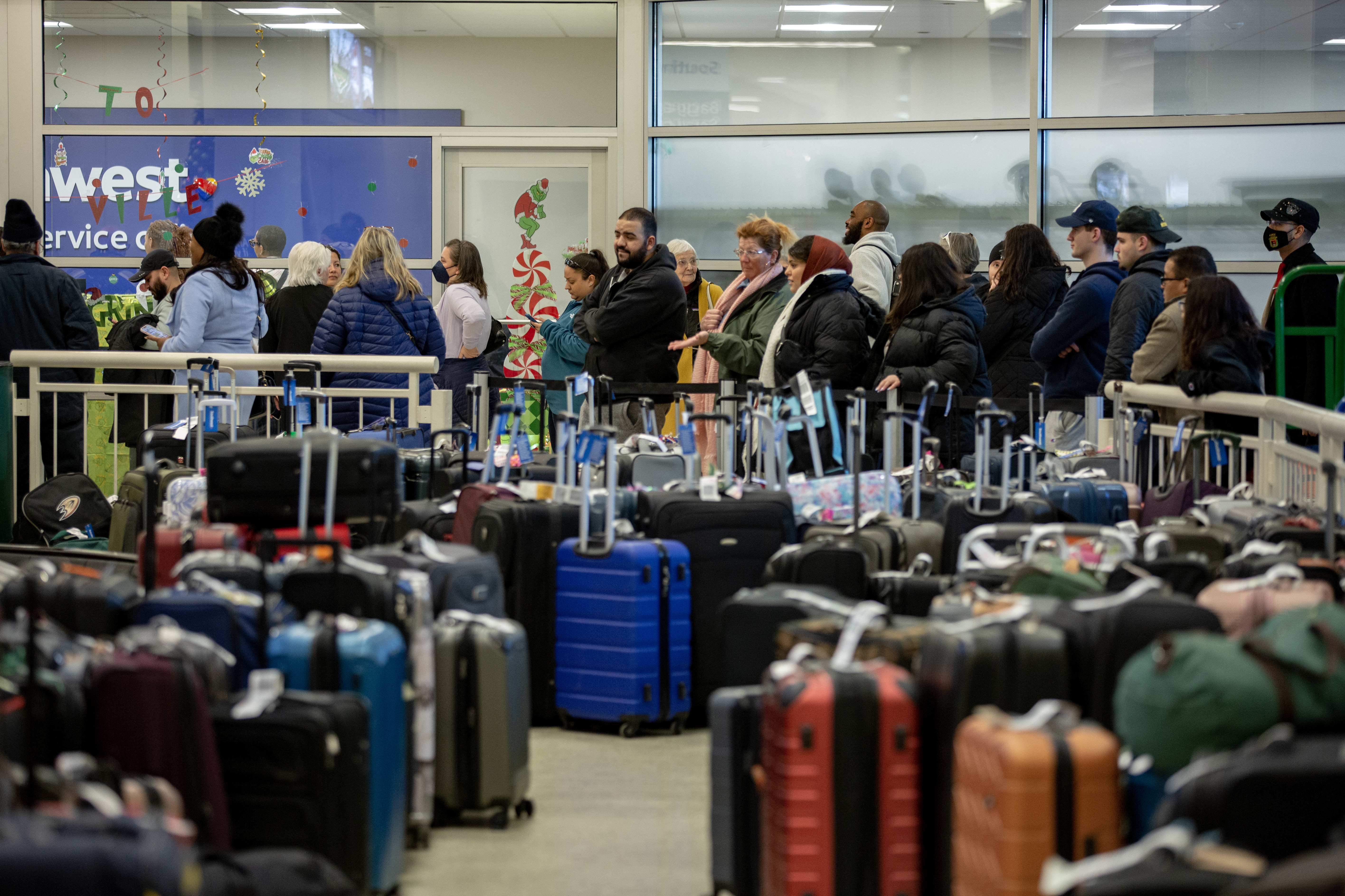 Passengers stranded, bags pile up as Southwest cancels flights