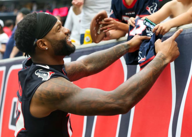 Collins Signs Autographs