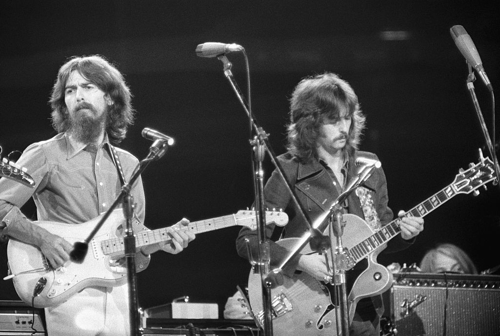George Harrison and Eric Clapton Performing