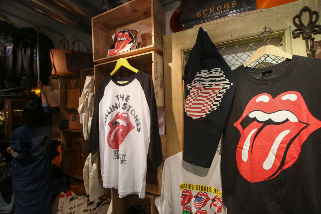 Interior of Retrostone shop, including T-shirts emblazoned with The Beatles, The Rolling Stones, Pink Floyd and Iron Maiden. Retrostone, B23, Basement, Trendy Zone, Mong Kok. 23MAY16 SCMP/Nora Tam [FEATURES FASHION]